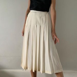 Nina Ricci cream silk pleated skirt, size 4